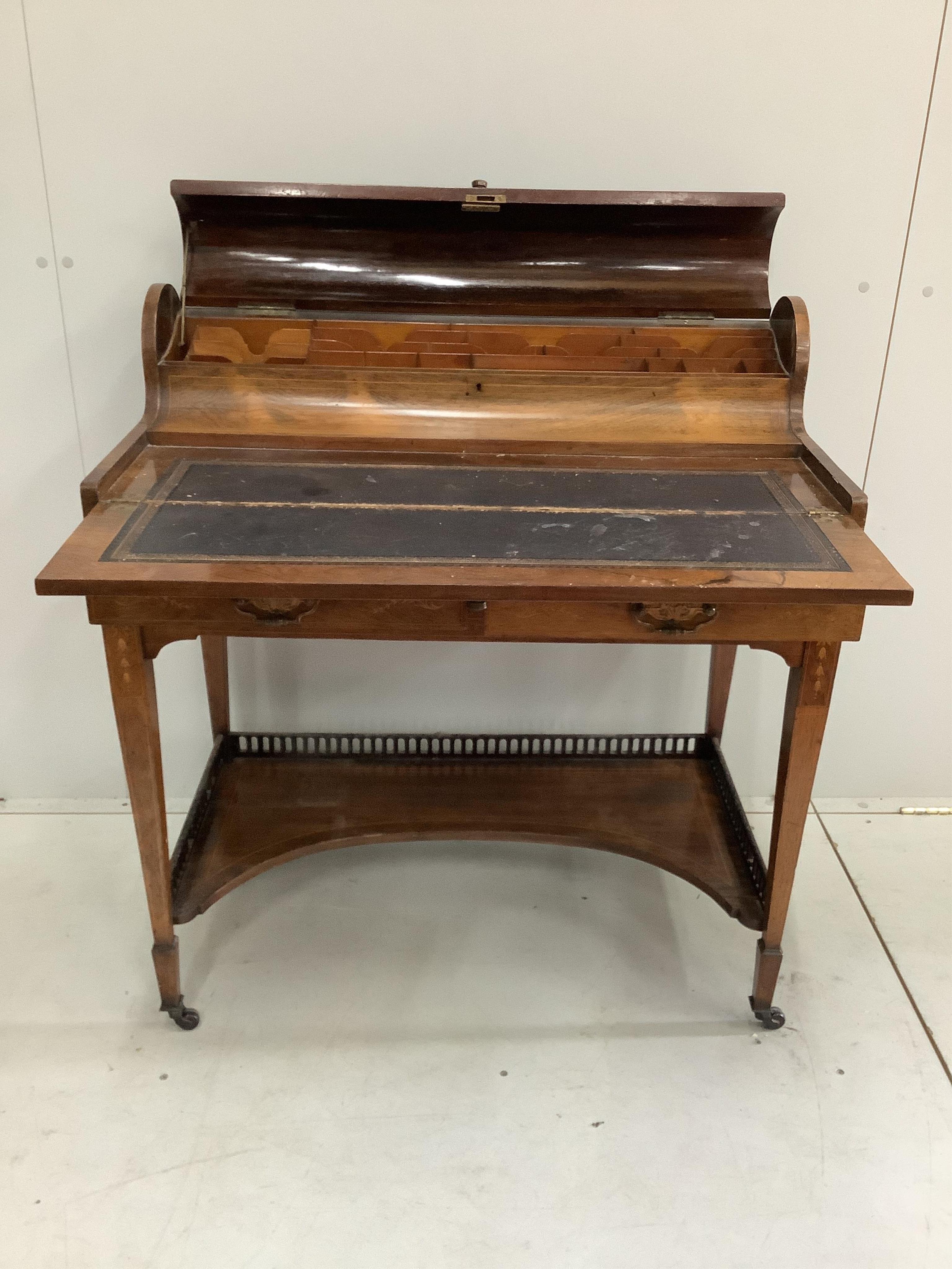 An Edwardian inlaid rosewood bonheur de jour, width 84cm, depth 46cm, height 91cm. Condition - fair